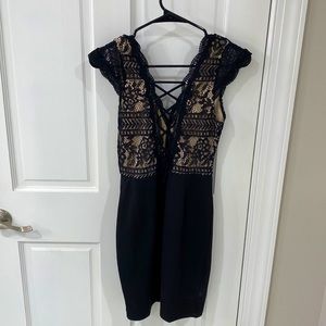 Lulus cocktail dress. Black and nude. Lace up in the back. Size small